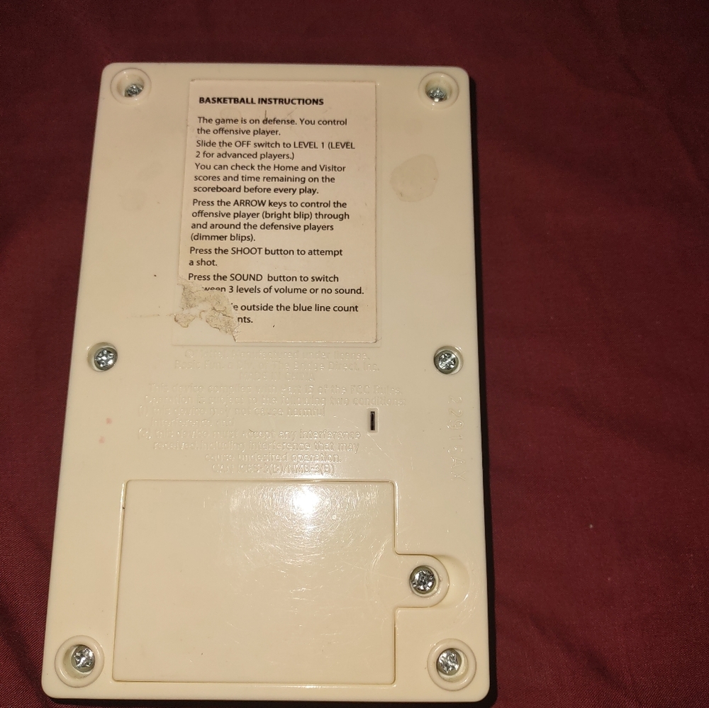 Throwback handheld basketball game